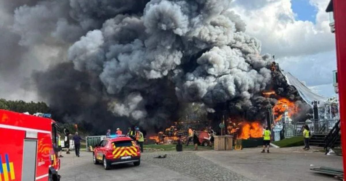 Tomorrowland 2025 fire scene showing crowd evacuation and stage collapse in Belgium