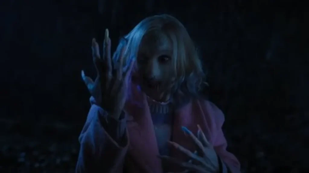 Enid Sinclair smiling in her werewolf form with bright pastel outfits